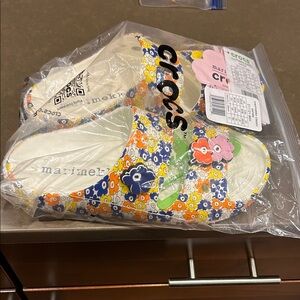 NWT CROCS X Marimekko Women’s Floral Sandals - Yellow, Blue, Orange on white